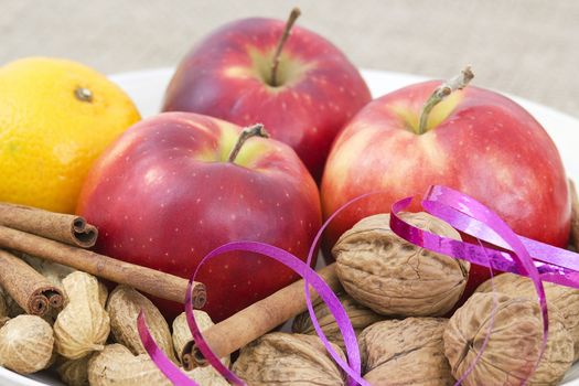 fruit, nuts and cinnamon sticks