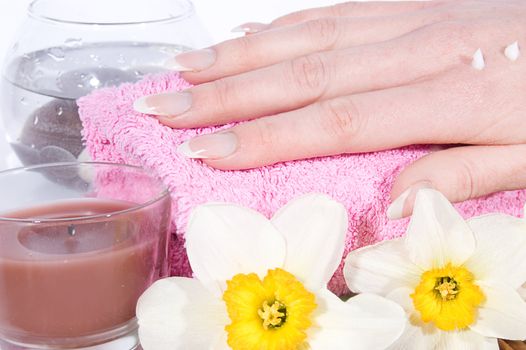 Woman hand with manicure on spa treatment