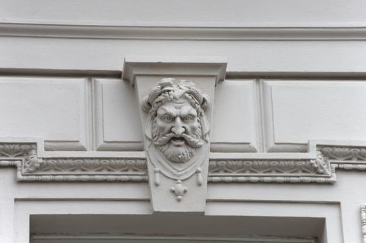 Mascarons. Architectural detail of the building