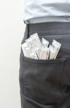 Condoms in the back pocket