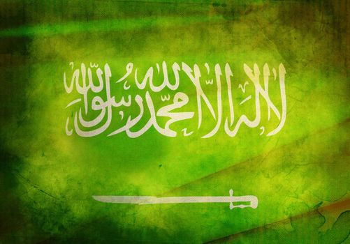 Saudi Arabian Flag on old and vintage grunge texture