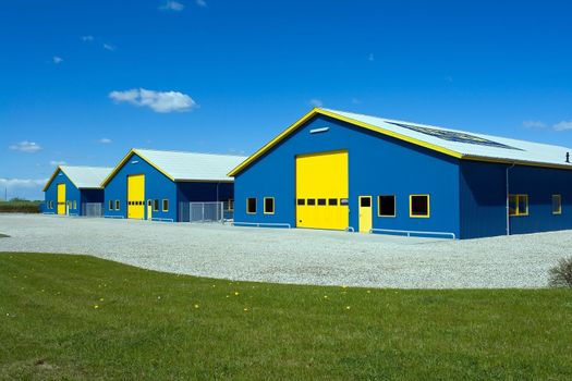 Modern Industrial distribution  delivery building in blue and yellow