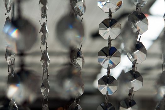 Crystal ornament hanging as a part of modern Chandelier 