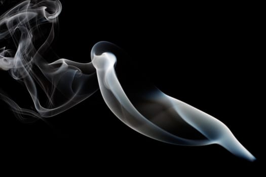 Abstract smoke curling and creating beautiful shapes