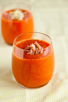 Glass filled with delicious cold soup; gazpacho