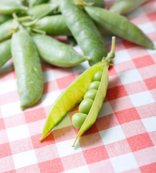 Peapods on a table