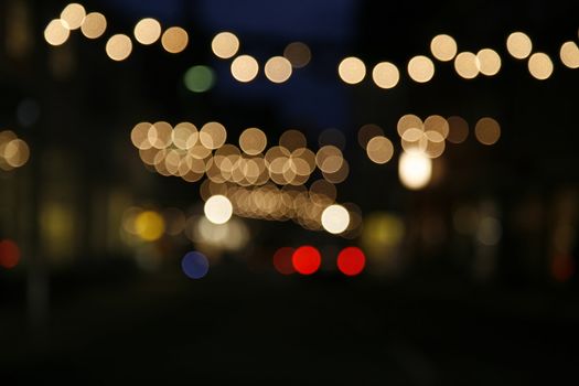 Blurred Christmas lights in town