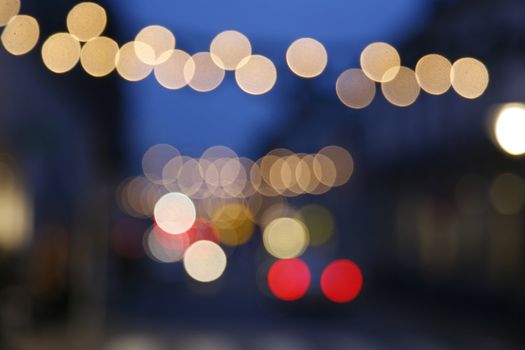 Blurred Christmas lights in town.
