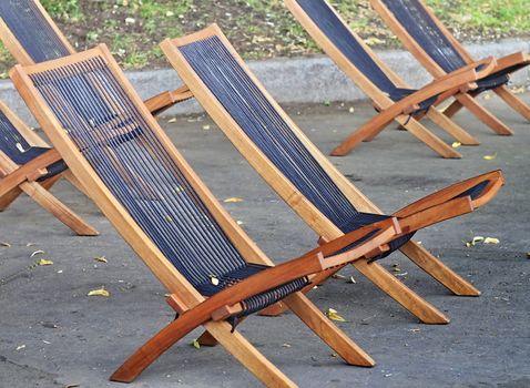 chairs in the park on the pavement