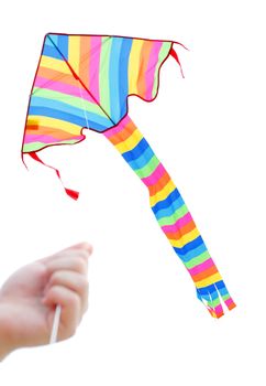 A boy playing with a kite