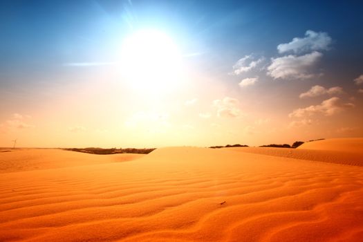 desert sand under blue sunny sky
