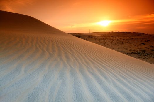 desert sand under blue sunny sky