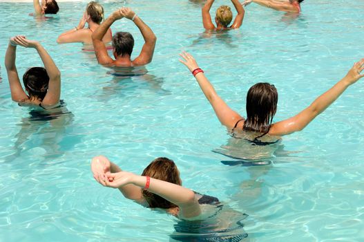 People are doing aerobic in pool
