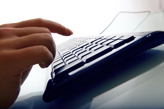 hand press a key on keyboard