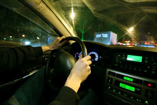 driver inside car night drive