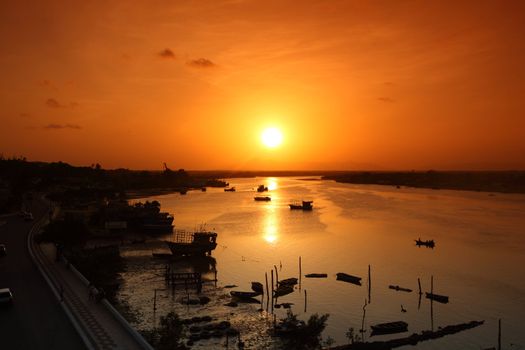 golden sun fall in to the river water