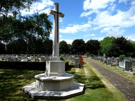 A graveyard cross that is within a graveyard.