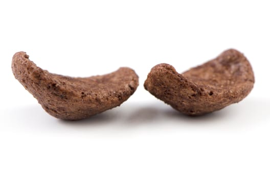 Chocolate cereals on a white background.