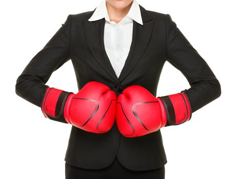 Competition ready - business concept. Businesswoman punching red boxing gloves together isolated on white background.