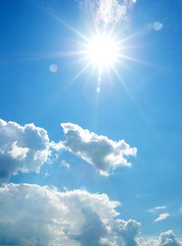 blue sky background with tiny clouds