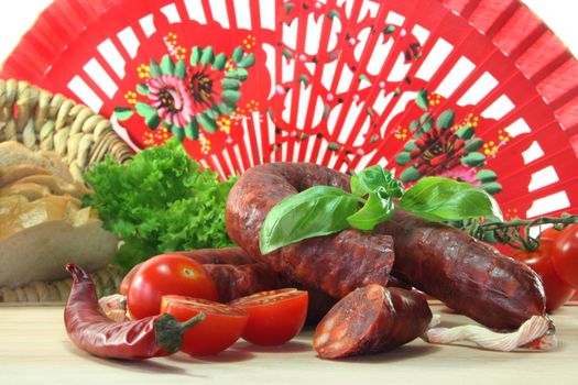 dried Spanish sausage with vegetables and herbs