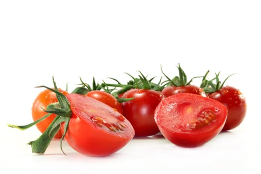 fresh, red tomatoes on white background