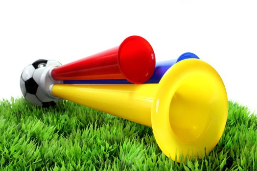 colorful football hooter on a piece of grass