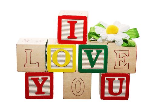 Phrase I LOVE YOU formed from wooden letter blocks