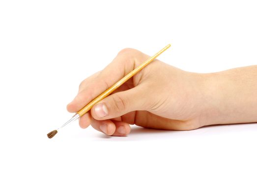 Isolated photo of a brush in a hand