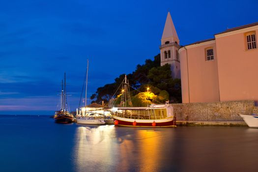 Town of Veli Losinj church and harbour at blue hour, Croatia