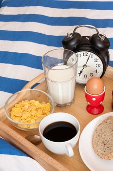 Breakfast in Bed - Bread, Coffee, Boiled Egg, Milk, Corn Flakes and Alarm Clock