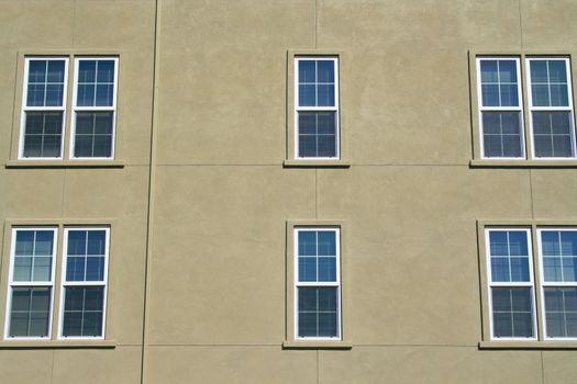 Close up of the windows of a building.
