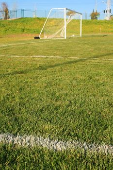 Soccer gate on a grass soccer field.
