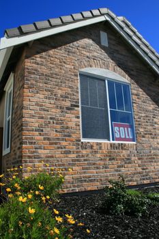 Close up of a new sold house.
