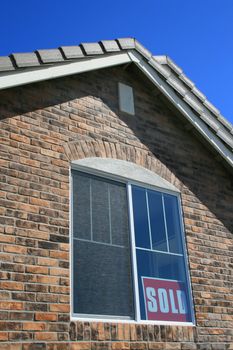 Close up of a new sold house.
