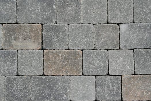 Close up of a stone wall showing unique pattern.
