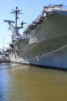 USS Hornet aircraft carrier on a sunny day.
