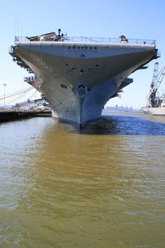 USS Hornet aircraft carrier on a sunny day.
