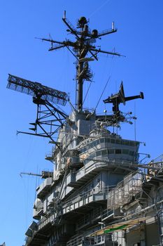 USS Hornet aircraft carrier on a sunny day.
