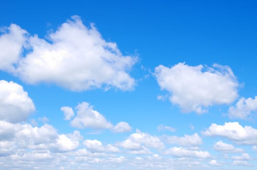 blue sky with clouds and sun