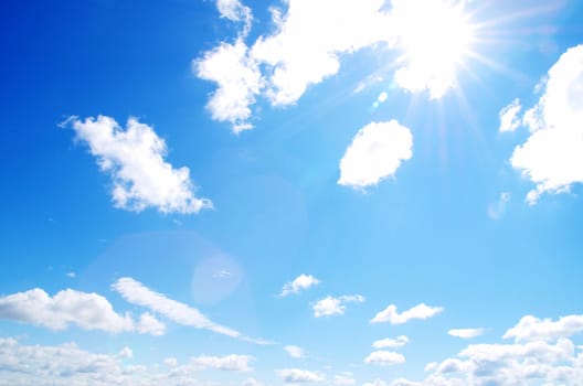 blue sky background with tiny clouds