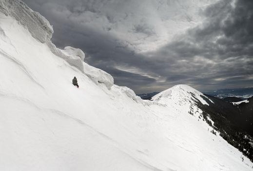 rage photographer under the snow cornices