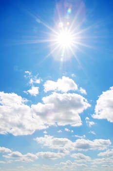 blue sky with clouds and sun