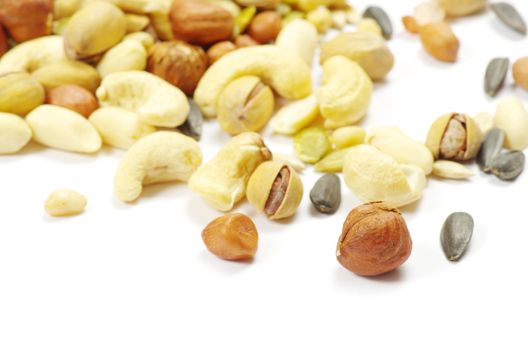 Assorted mixed nuts on white background