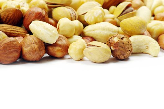 Assorted mixed nuts on white background