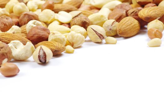 Assorted mixed nuts on white background