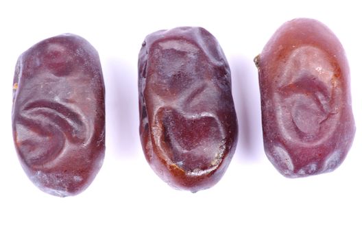 dryed dates on white background