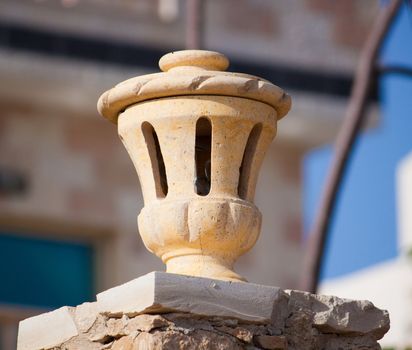 Photos clay lantern on the pillar of the fence