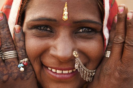 Portrait of a India Rajasthan woman with her henna tattoo