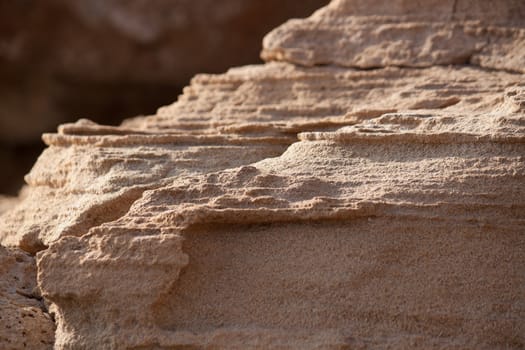 photo texture rocky cliff of sandstone brown